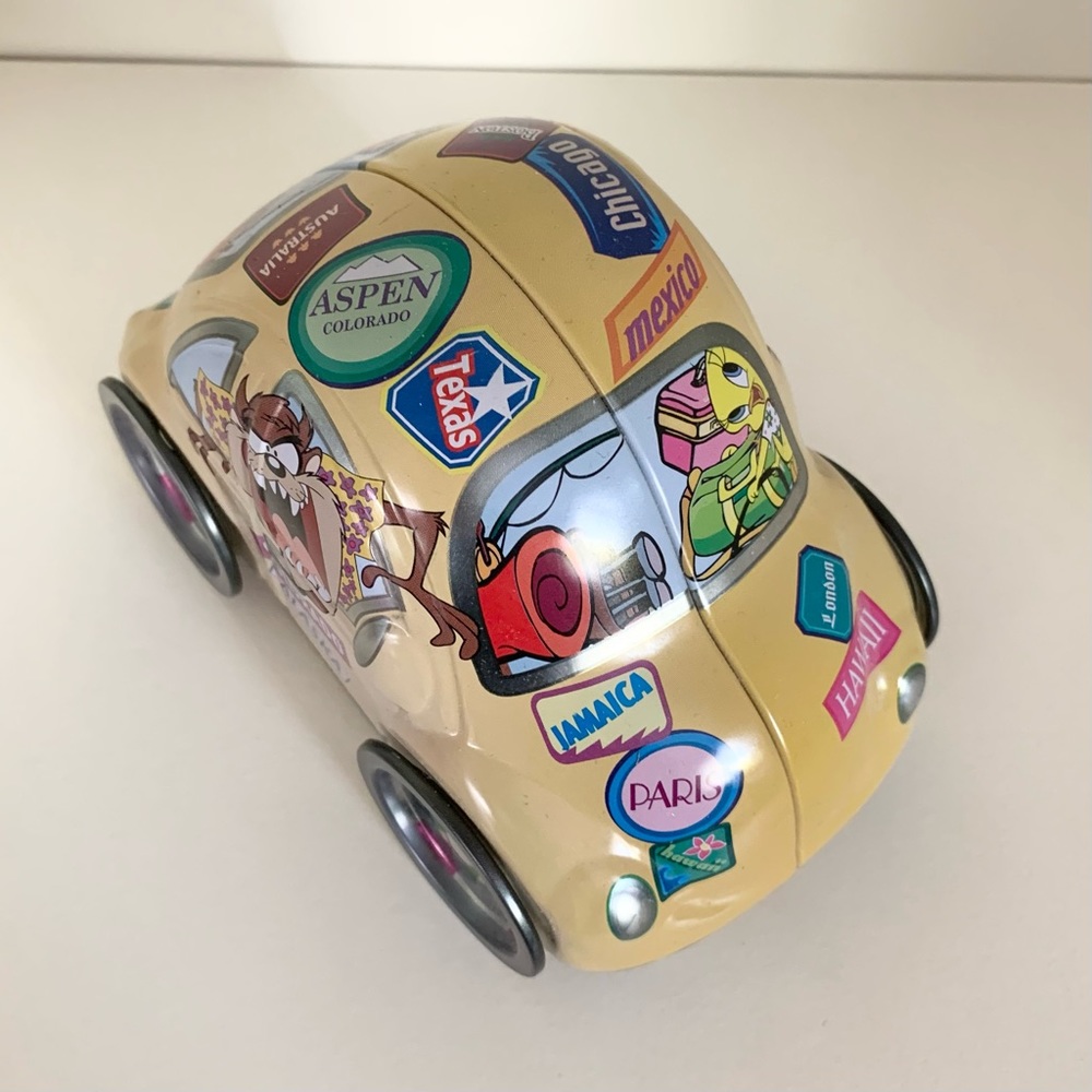 Hold Vintage Loony toons tin car canister